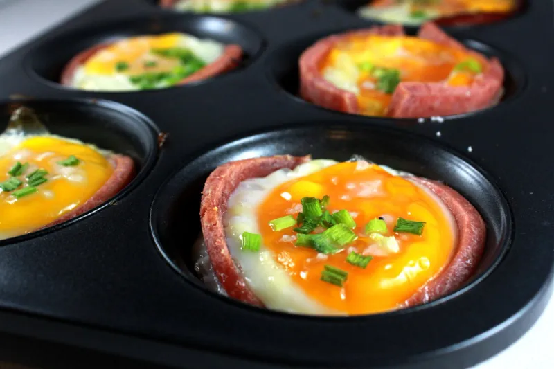 14. Baked Egg Cups with Ham and Cheese