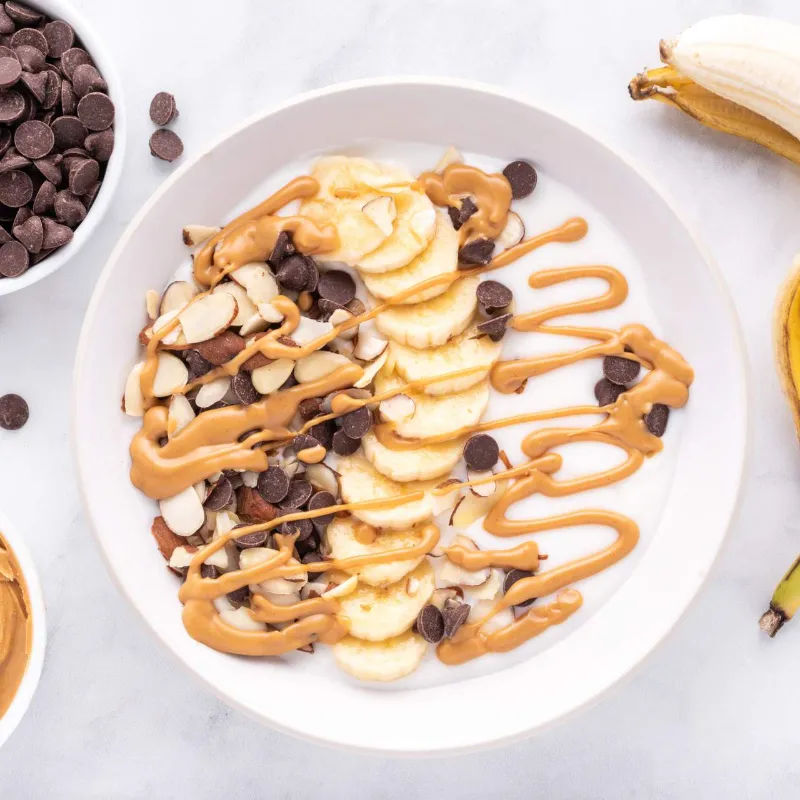 25 Protein-Packed Yogurt Breakfast Bowls You’ll Want Every Day 16. Peanut Butter Banana Yogurt Bowl