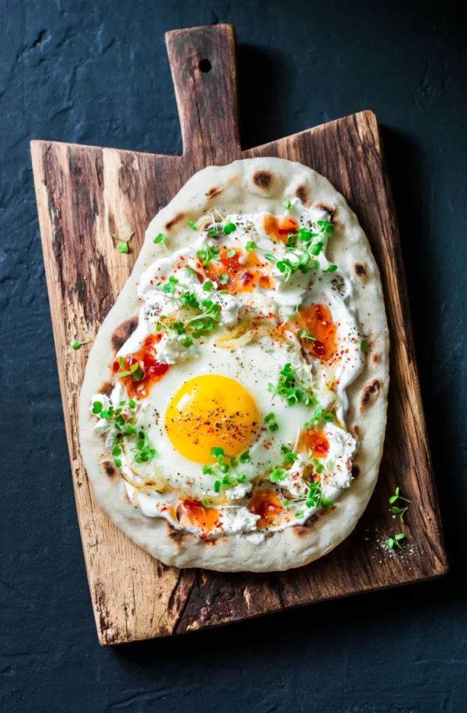 25 Protein-Packed Yogurt Breakfast Bowls You’ll Want Every Day 17. Yogurt Flatbread with Egg
