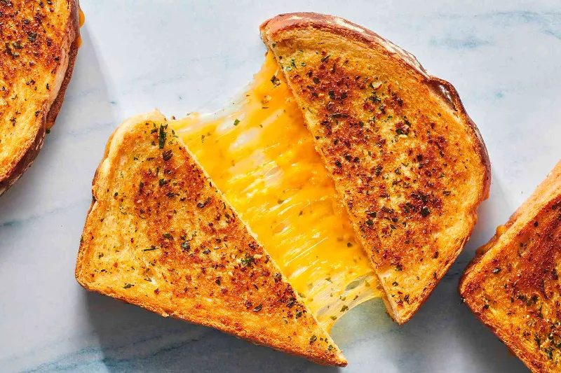 10 Garlic Toast Recipes That Will Make Your Kitchen Smell Like Heaven 2 Cheesy Garlic Toast