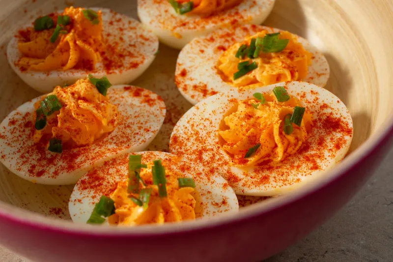 20. Classic Deviled Eggs with Paprika and Chives