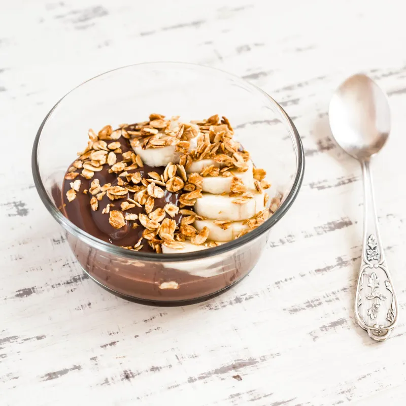 25 Protein-Packed Yogurt Breakfast Bowls You’ll Want Every Day 25. Chocolate Banana Yogurt Bowl