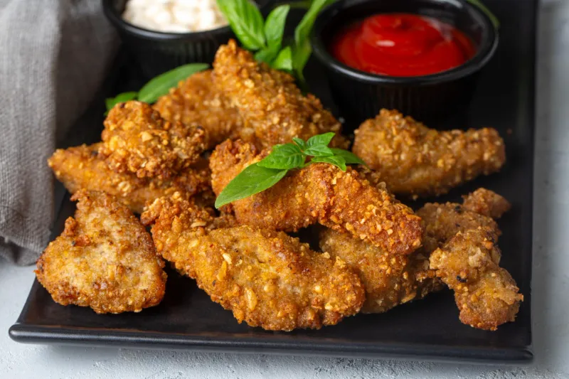 10 Crispy Chicken Finger Recipes That Will Make Your Kids Beg for Seconds 6 Cornflake Crusted Chicken Fingers