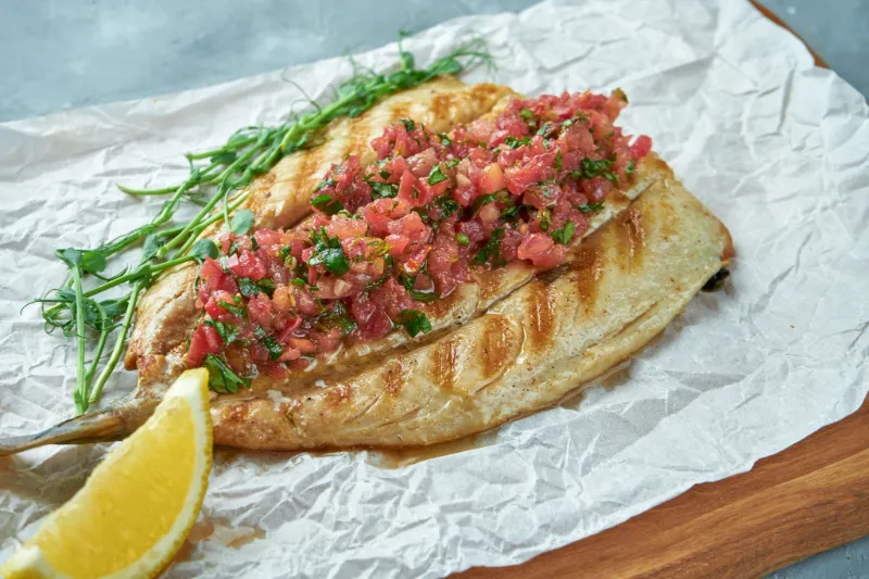 8. Smoky Tomato Basil Grilled Sea Bass