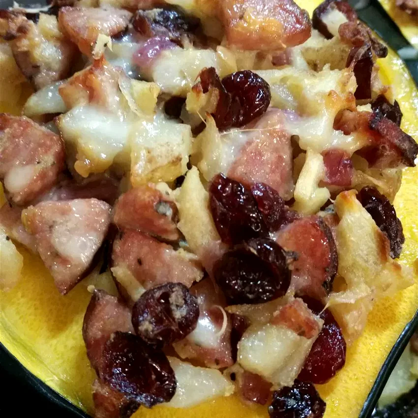 12 Delicious Roasted Acorn Squash Dishes for Fall Cooking Acorn Squash Stuffed with Apple, Cranberry, and Sausage