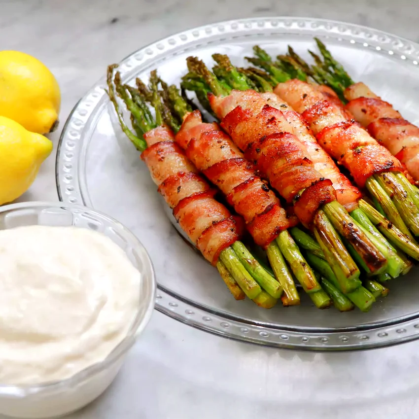37 Fresh Spring Appetizer Ideas for Every Gathering Bacon-Wrapped Asparagus with Lemon Aioli