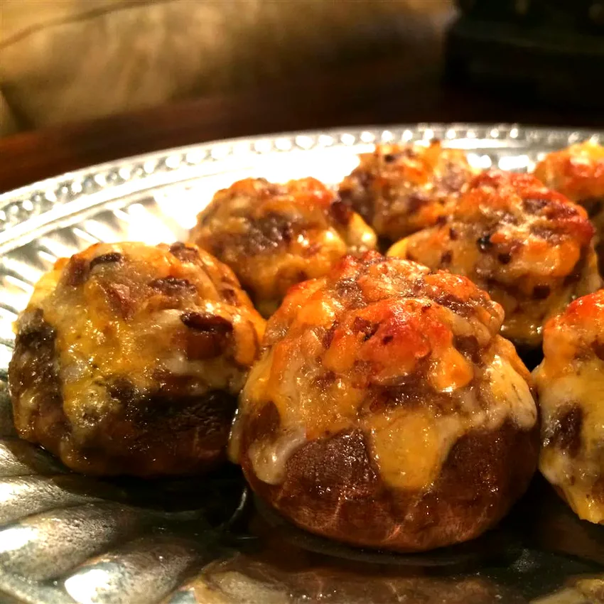 32 Simple Game Day Appetizers for Super Bowl Parties Bacon and Cheddar Stuffed Mushrooms