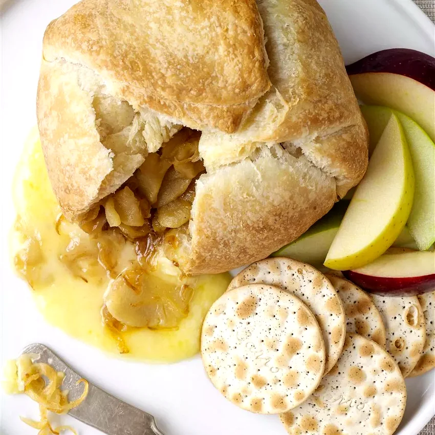 30 Crowd-Pleasing Party Appetizers Your Guests Adore Baked Brie with Caramelized Onions