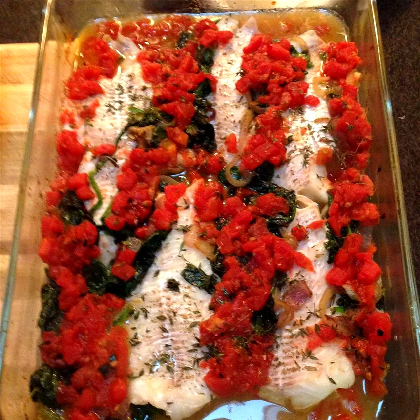Baked Haddock with Spinach and Tomatoes