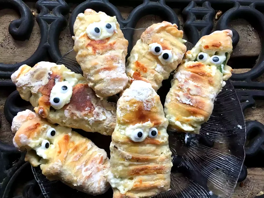 24 Spooky Halloween Dinner & Party Ideas That Will Wow Baked Mummy Jalapeno Poppers
