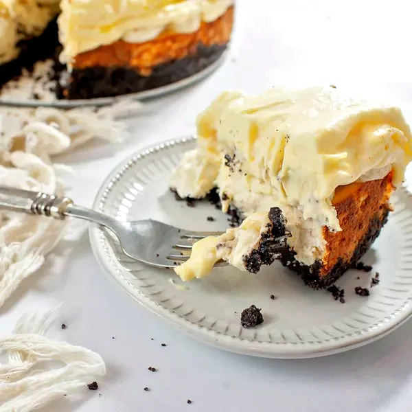 31 Elegant Cake Recipes That Will Wow Your Guests Banana Cheesecake with Banana Cream Pie Topping