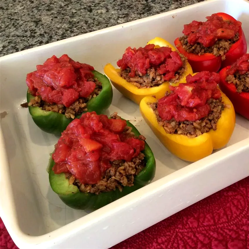 12 Ground Bison Dishes That Expand Beyond Basic Burgers Bison and Brown Rice Stuffed Peppers