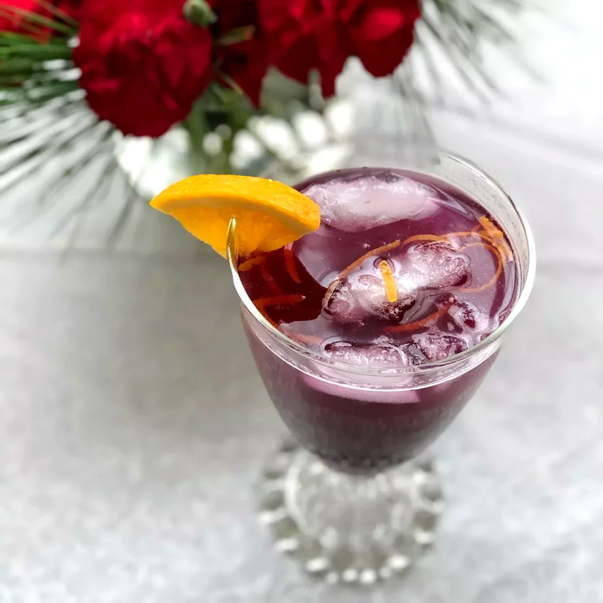 23 Festive Holiday Drinks Without Alcohol for Everyone Blueberry-Ginger Fizz