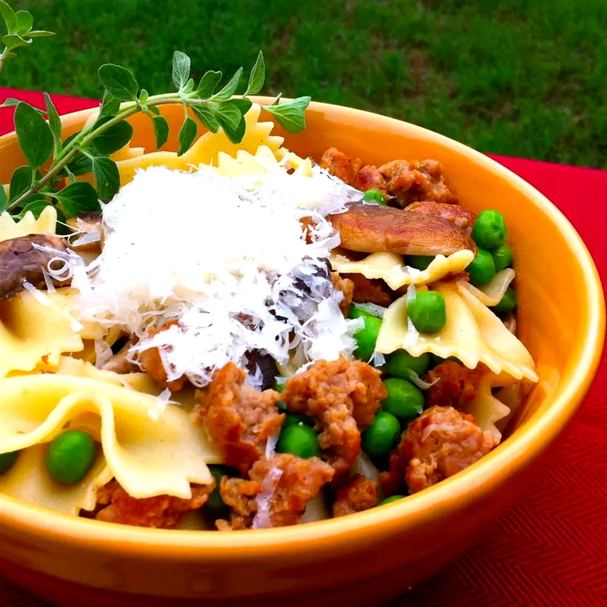 Top 20 Mushroom Pasta Dishes for Comfort Food Lovers Bow-Tie Pasta with Sausage, Peas, and Mushrooms