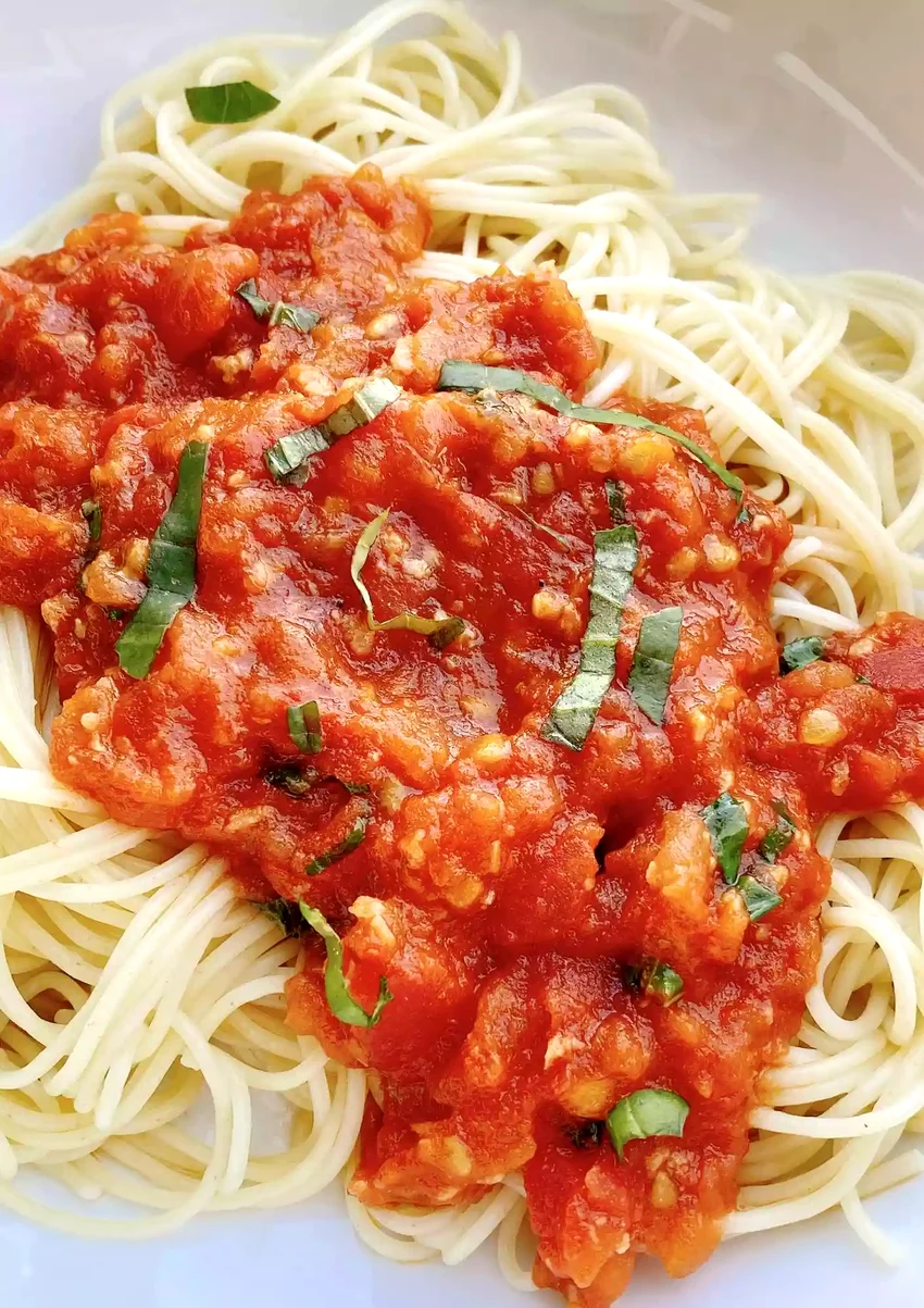 34 Classic Italian Pasta Dishes That Everyone Adores Capellini Pomodoro (Pasta with Fresh Tomato Sauce)