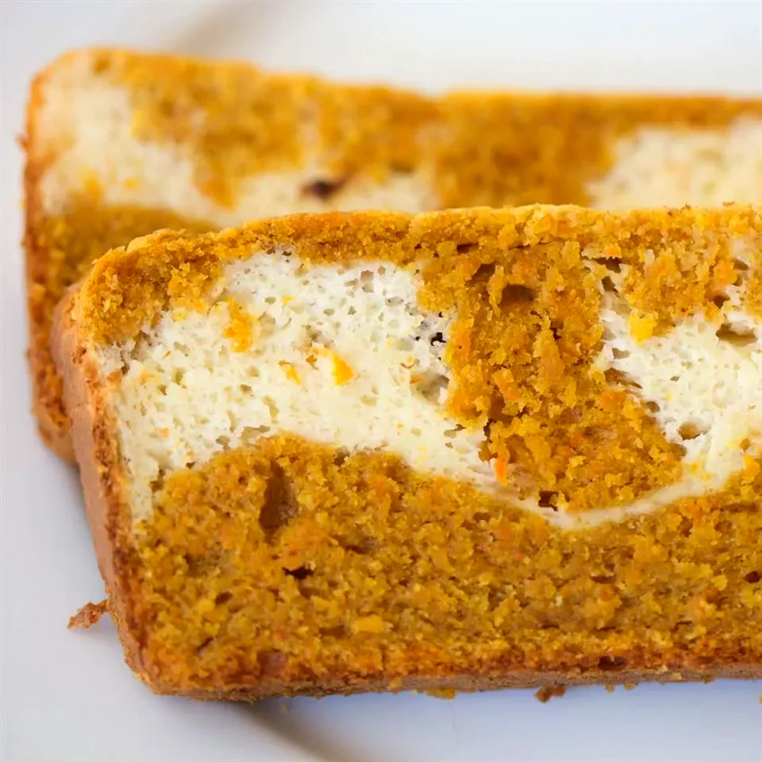 13 Creative Carrot Dessert Ideas Perfect for Easter Carrot Cake with Bourbon Cheesecake Swirl