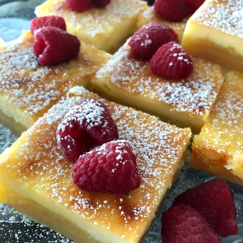 12 Lemon Cheesecake Recipes That Citrus Fans Will Adore Cheesecake Lemon Bars