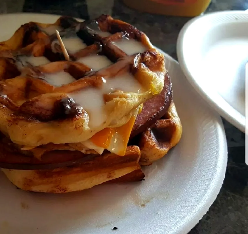 14 Creative Waffle Iron Recipes That Go Beyond Waffles Cinnamon Roll Waffle Breakfast Sandwich