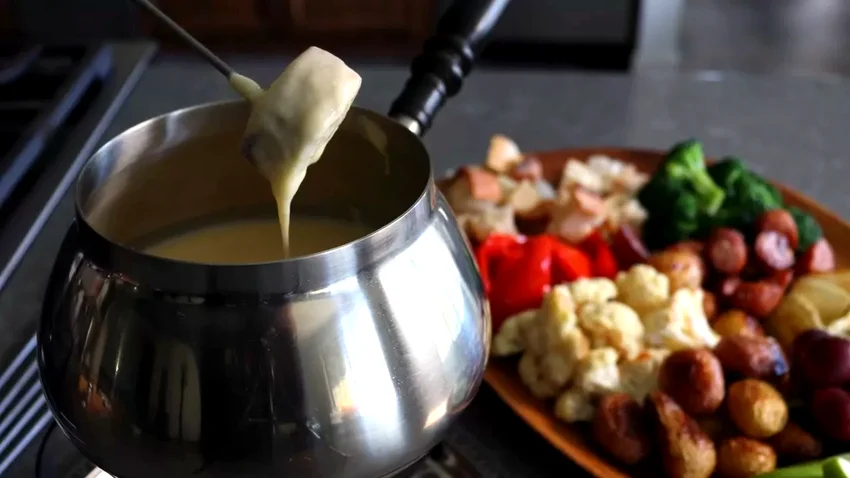 10 Amazing Friendsgiving Recipes Your Guests Will Love Classic Cheese Fondue