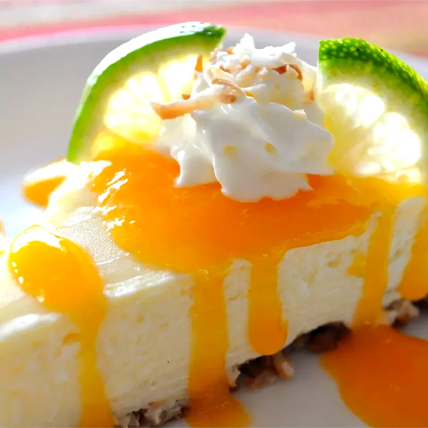 Coconut-Lime Cheesecake with Mango Coulis