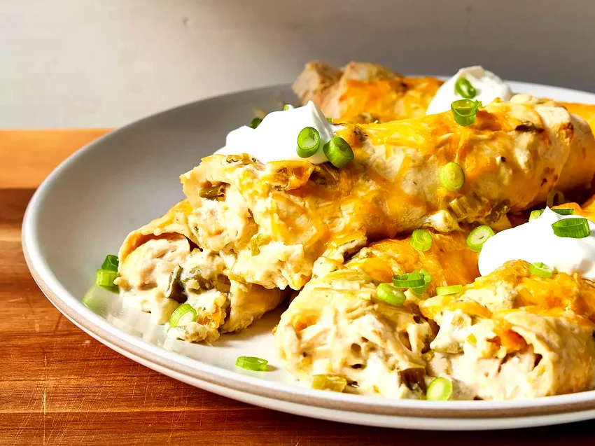 25 Easy Rotisserie Chicken Casserole Recipes for Busy Nights Creamy Chicken Enchiladas