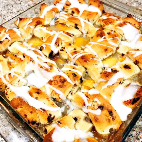 Decadent Cinnamon Roll Peach Cobbler