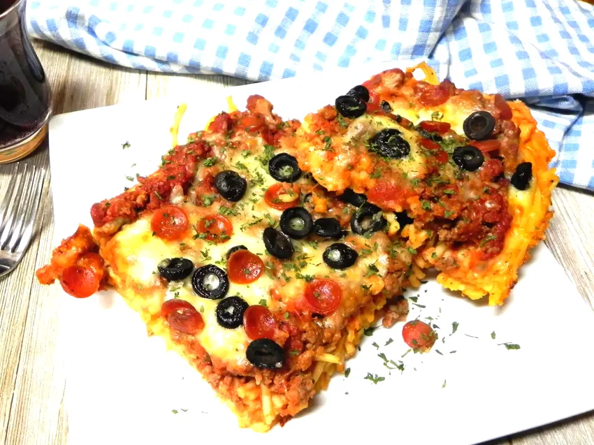 24 Italian Baked Dishes That Will Make Nonna Smile Deep-Dish Spaghetti Pizza