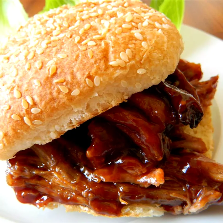 24 Crockpot Game Day Favorites for Your Next Tailgate Easy, Two-Ingredient Pulled Pork