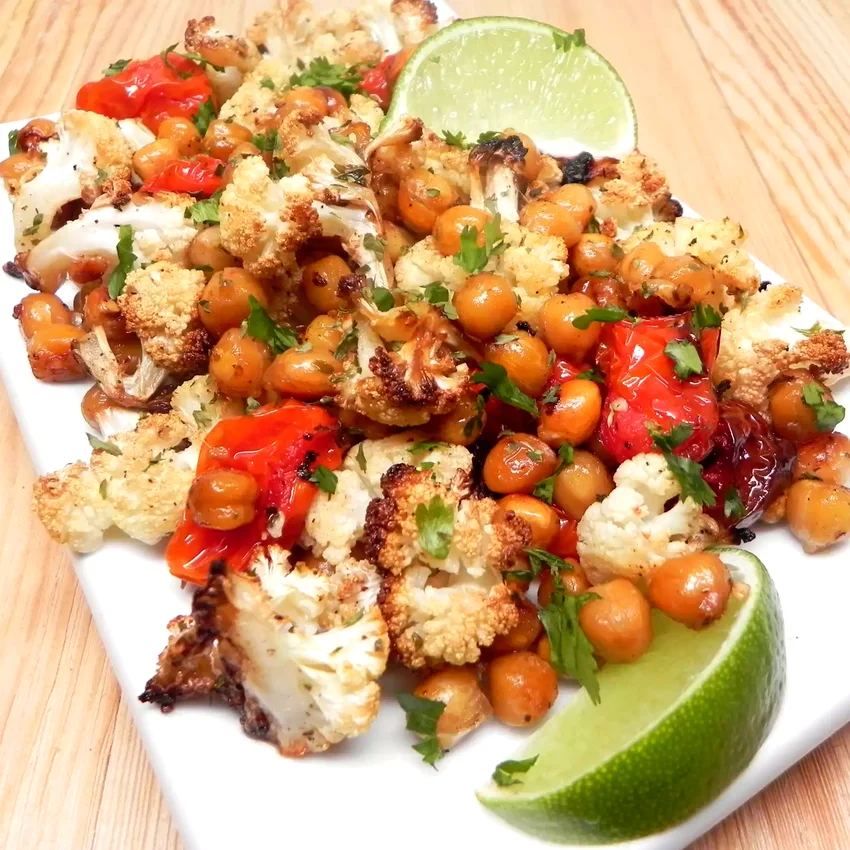Easy Vegan Sheet Pan Roasted Cauliflower, Tomatoes, and Garbanzo Beans