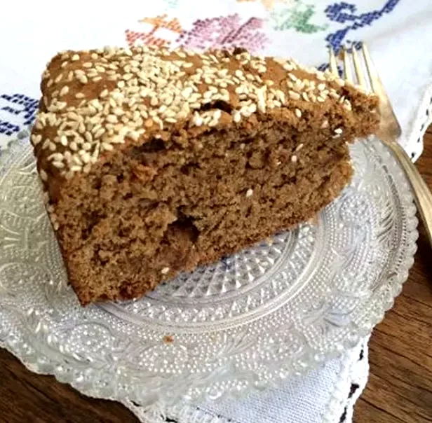12 Olive Oil Cake Ideas That Will Delight Your Sweet Cravings Fanouropita (Vegan Greek Raisin, Walnut, and Olive Oil Cake)