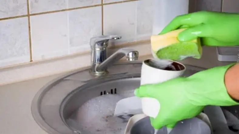 Fill A Sink With Water And Dishwashing Liquid