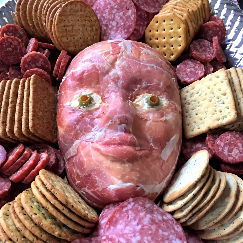 23 Spooky Halloween Party Foods for Your Frightful Feast Flayed Man Cheese Ball
