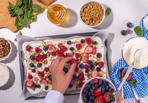 Frozen yogurt bark with nuts and berries