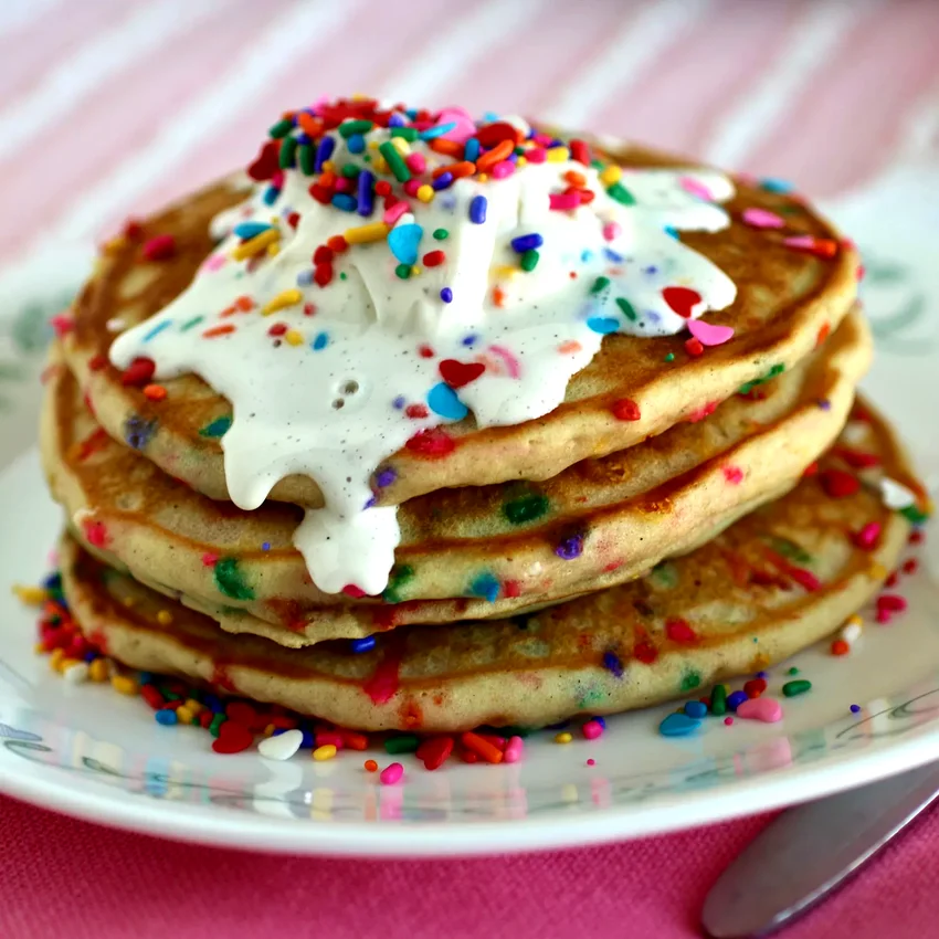 15 Sweet Breakfast Ideas That Taste Like Amazing Desserts Funfetti® Pancakes with Vanilla Cream Sprinkle Sauce