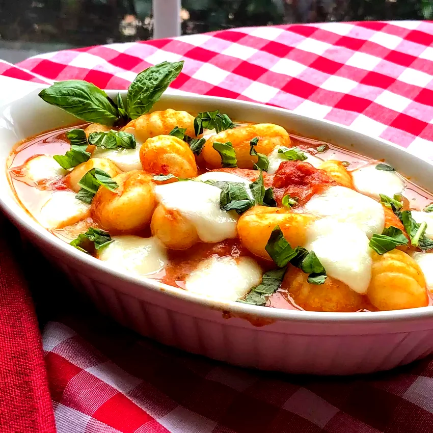 34 Classic Italian Pasta Dishes That Everyone Adores Gnocchi with Tomato Sauce and Mozzarella