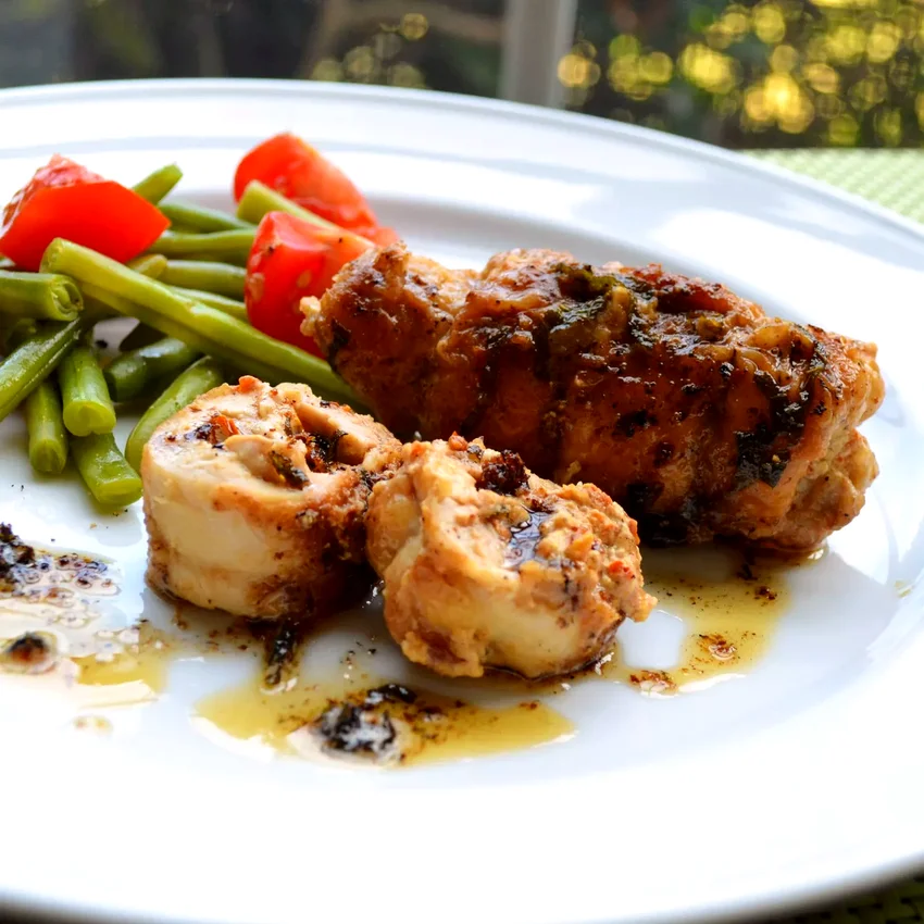 17 Delicious Chicken and Tomato Recipe Ideas Goat Cheese and Sun-Dried Tomato Stuffed Chicken Thighs with Sage Brown Butter Sauce