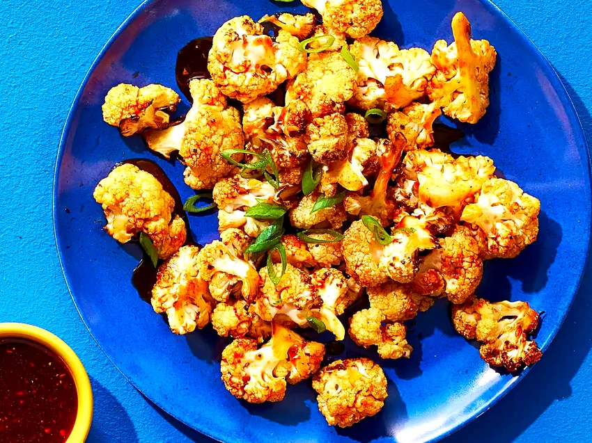 12 Fiery Honey Dishes for Sweet and Spicy Food Lovers Gochujang-Sauced Air Fryer Cauliflower Bites