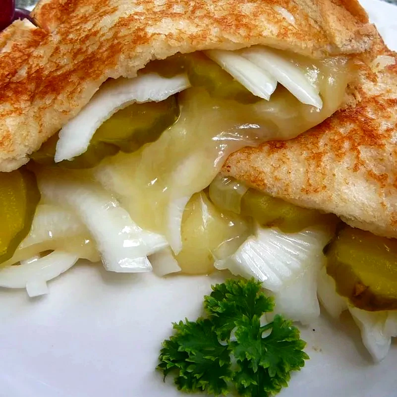 18 Amazing Recipes That Feature Pickles as the Star Grilled Cheese, Pickle and Vidalia Onion Sandwich