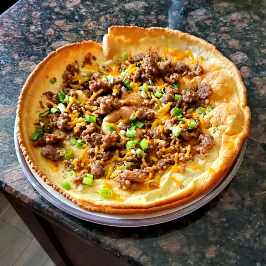 20 Morning Meals That Make Perfect—and Simple—Dinners Herb, Sausage, and Cheese Dutch Baby