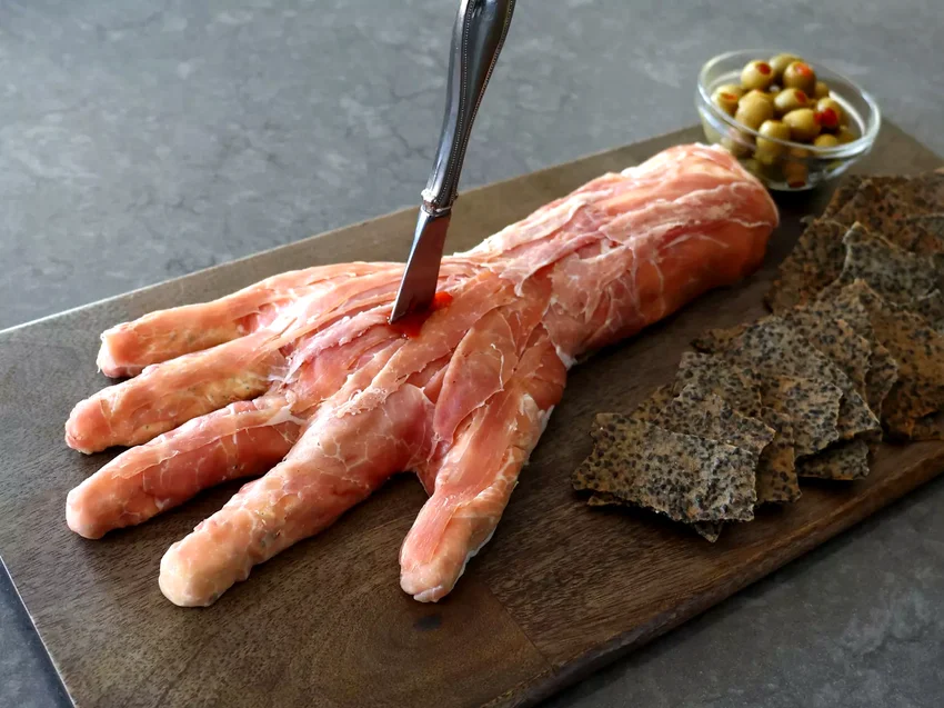 24 Spooky Halloween Dinner & Party Ideas That Will Wow “Horrible Hand” Ham and Cheese Board