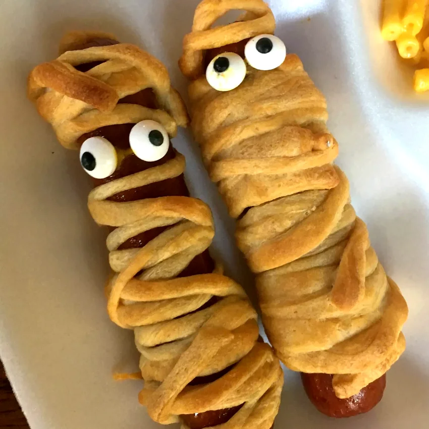 24 Spooky Halloween Dinner & Party Ideas That Will Wow Hot Dog Mummies