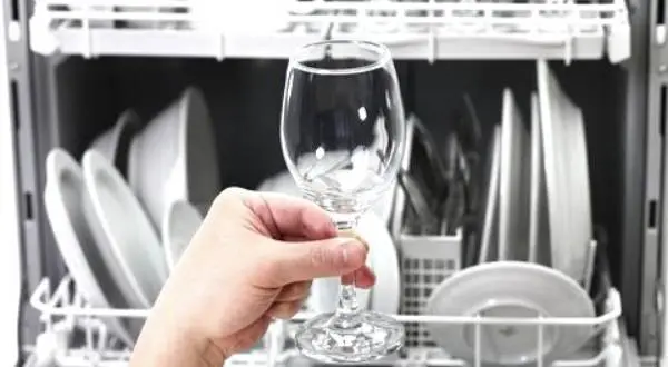 How to prevent the buildup of hard water stains in a dishwasher