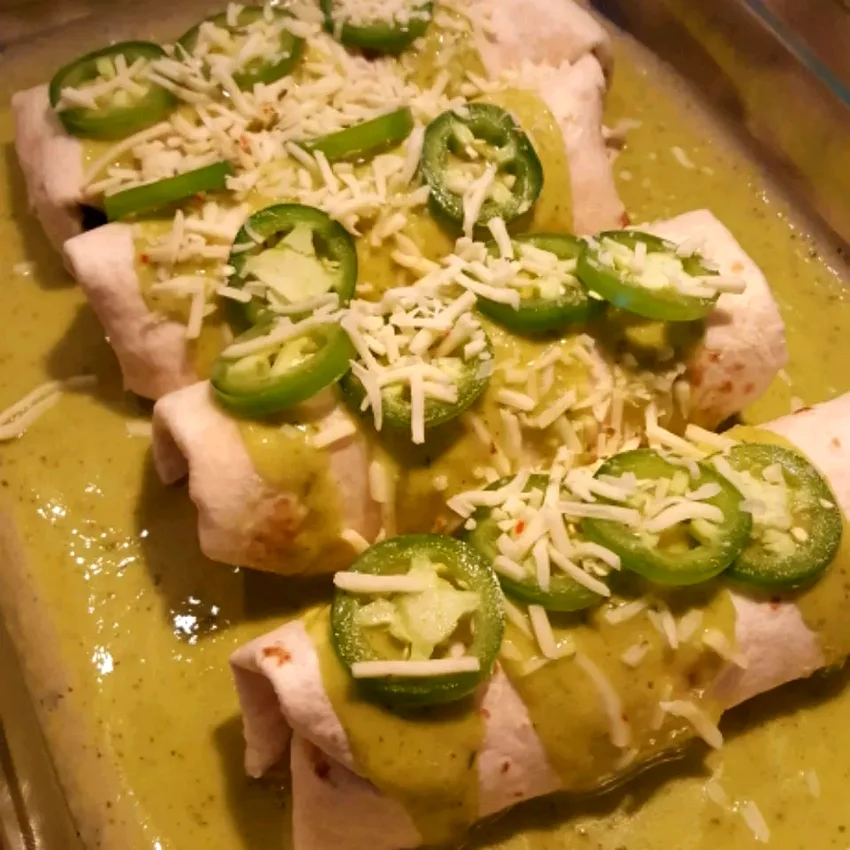 30 Fiery Chicken Dishes That Pack Serious Heat Jalapeño Cream Cheese Chicken Enchiladas