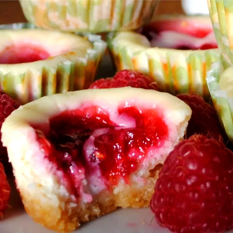 12 Bite-Sized Cheesecakes Packed With Amazing Flavors Key Lime Cheesecakes with Raspberry Swirls
