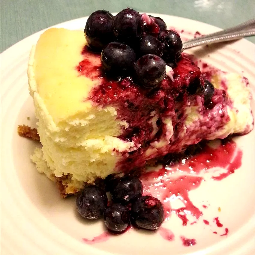 15 Bright Lemon-Blueberry Desserts to Sweeten Your Day Lemon Souffle Cheesecake with Blueberry Topping