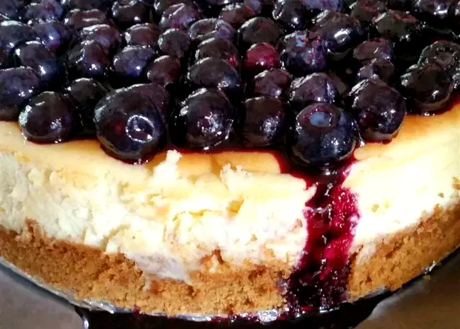 21 Amazing Lemon Sweet Treats to Brighten Your Day Lemon Souffle Cheesecake with Blueberry Topping