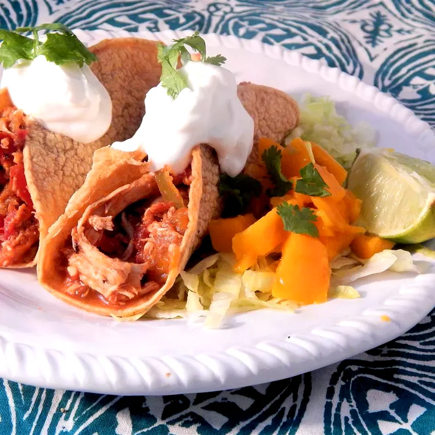 24 Easy Dishes Using Leftover Shredded Chicken Mango-Lime Shredded Chicken Tacos