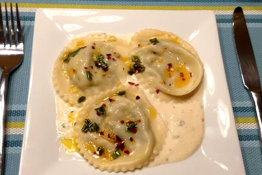 Top 20 Mushroom Pasta Dishes for Comfort Food Lovers Mushroom and Spinach Ravioli with Chive Butter Sauce
