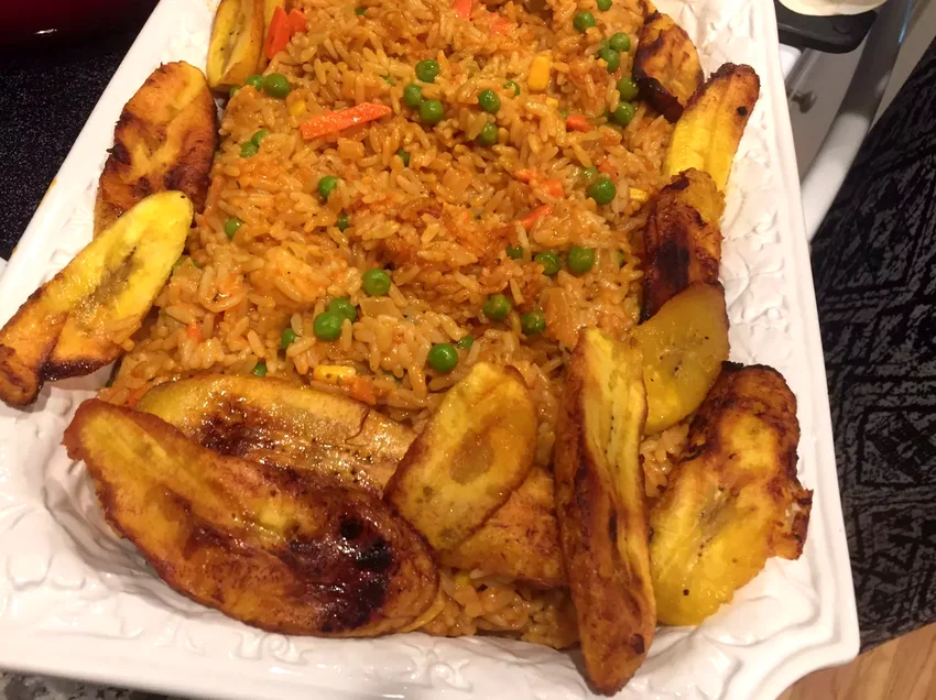 Nigerian Jollof Rice with Chicken and Fried Plantains