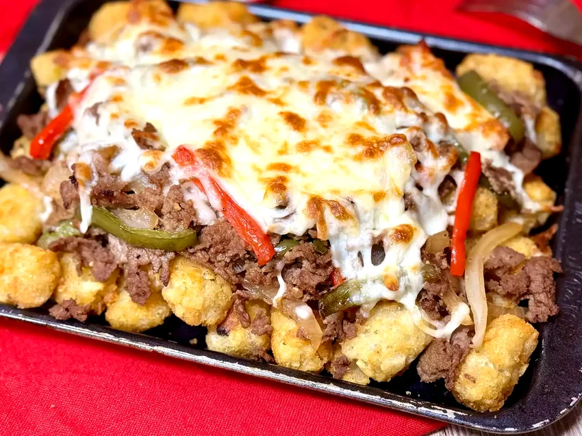 25 Simple Meals That Begin with Frozen Potato Products Philly Cheesesteak Smothered Tater Tots